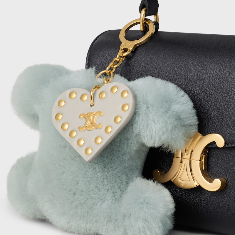triomphe pom-pom keyring with heart in shearling and calfskin with gold finishing