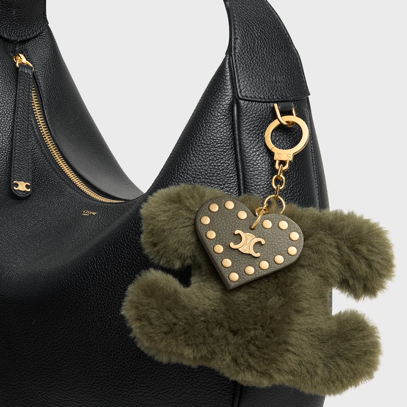 triomphe pom-pom charm in shearling and calfskin