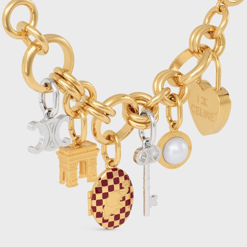celine charms elephant locket in brass with gold finish enamel and steel