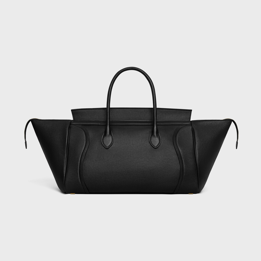 medium new luggage in supple shiny lambskin