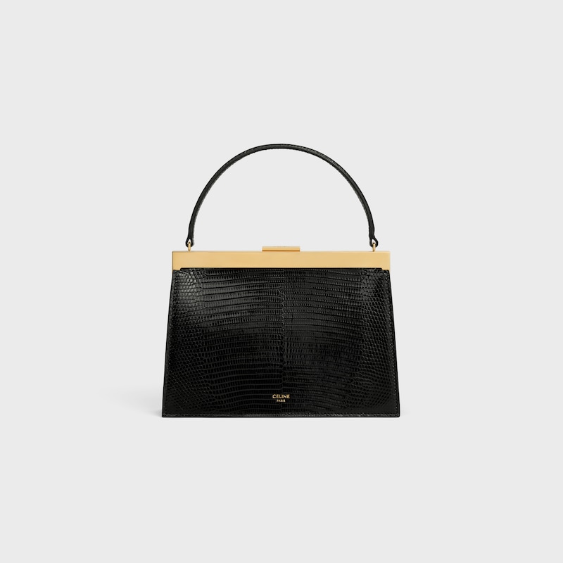 small celine augustine in lizard