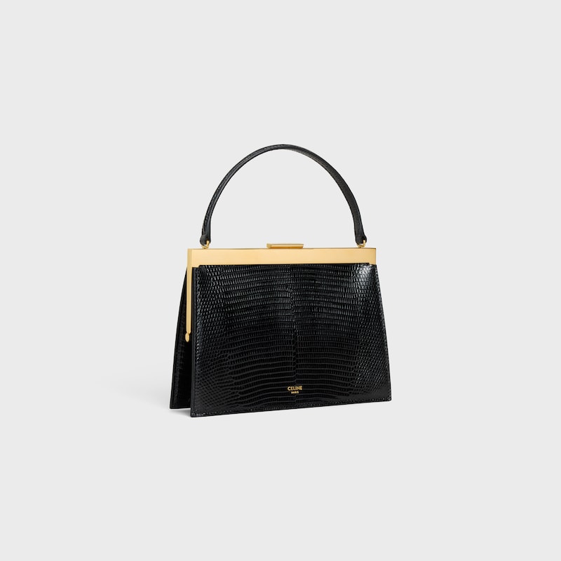 small celine augustine in lizard
