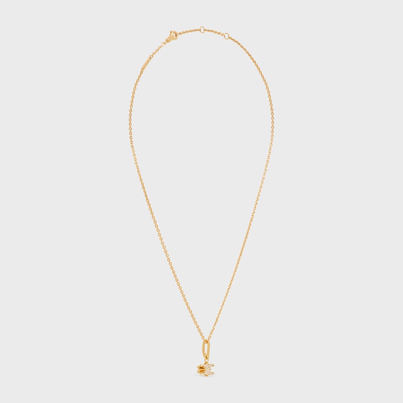triomphe solitaire sparkle necklace in strass and brass with gold finish
